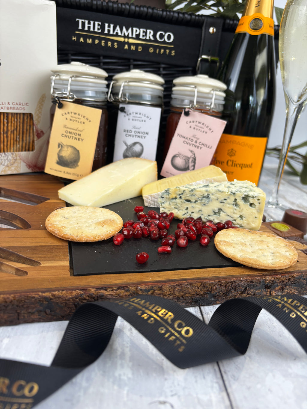 lytton house acacia wood cheese board, cartwright & butler chutney, verve cliquot champagne close up ribbon and chamagne 